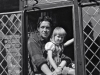 036-Dad-and-Cathy-in-a-window-at-Tudor-Cottage-c-1956