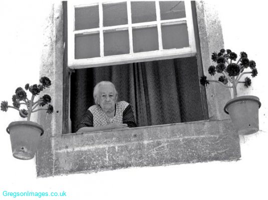37bw-face-in-a-window-portugal
